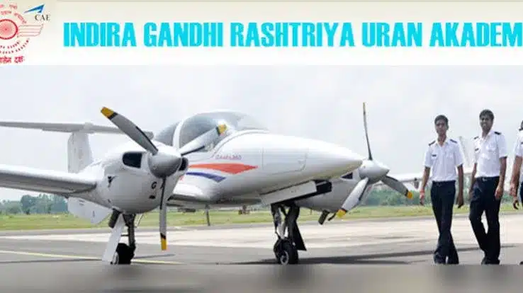 IGRUA trainee pilots beside a Diamond training aircraft at Fursatganj